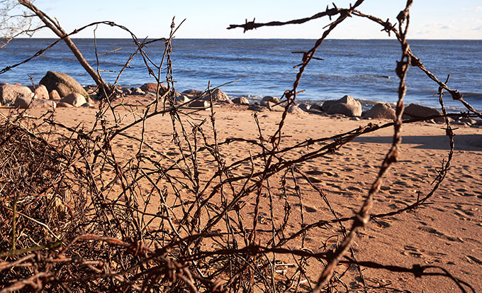 Barbed wire on the shore at Fort Ino